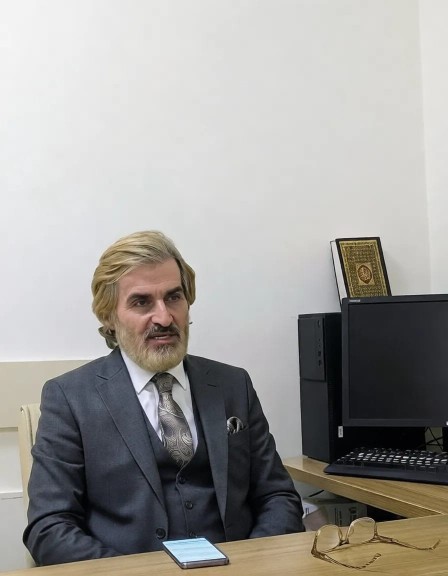 A portrait of Dr. Yasser Hassan